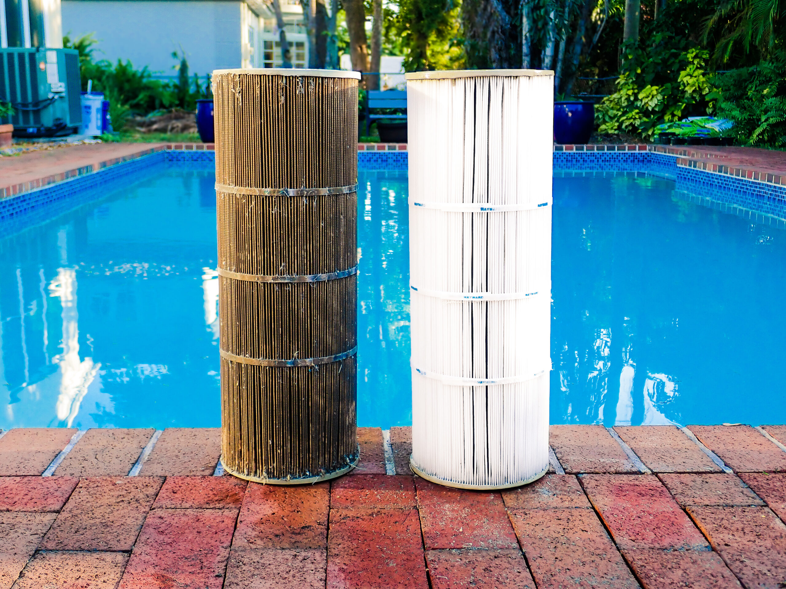Semi-Annual Pool Filter Cleaning: a dirty pool filter cartridge next to a freshly cleaned one